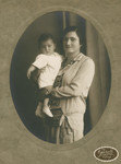 Studio portrait of Boriska Blatt holding her infant son Robert.