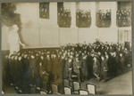 Students at the von Bissing University in Gent gather  in the central auditorium of the Aula on Vorderstraat.
