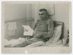 Jozef Rakowski recuperates in his hospital bed following liberation from Mauthausen.