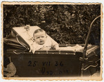Sala Perec rests in her baby carriage in prewar Chelm.