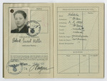 Identification papers issued to Robert Israel Keller stating he was born in Vienna on August 3, 1926.