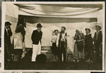 The theater troupe in the Bamberg displaced persons camp performs Sholom Aleichem's Die Grosse Genvinz, directed by Solomon Zynstein.
