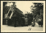 Members of the Bamberg Yiddish Theater group load a truck with props as they prepare to perform a play in a neighboring displaced persons camp.