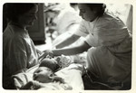 Nurses tend to newborn babies in a makeshift maternity ward in besieged Warsaw.