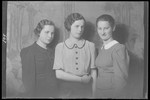 Studio portrait of three young women, including Frida Fried
