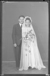 Studio wedding portrait of Izsak Deuts and his bride.