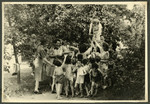 Jewish children from the Nos Petits children's home visit a fruit orchard.