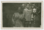 A postwar photograph of Bertha, Joe, and Simi Leitner with Bertha's mother, Rose.