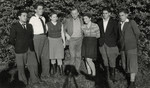 Group of young adults, [perhaps at the Chantilly children's home.]

Ita Shapiro is in the striped sweater with Zalman, the representative from Israel.