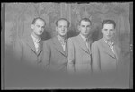 Studio portrait of Zoltan Schvartz and three other men.
