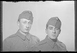Studio portrait of Erno Silberstein and another man, both in military uniform.