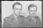 Studio portrait of Tibor Rozenberg and another man, both in uniform.