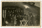 Group portrait of Jewish displaced persons in the Landsberg camp at a memorial service.