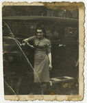 Prewar portrait of Mania (last name unknown) leaning against an automobile and given to Fela Zyndorf in the Bobrek concentration camp.