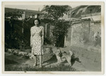 Betty Straus poses with her dog in a garden in Utrecht.