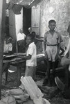 Haitian children work in Walter Meinberg's factory.