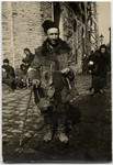 Close-up portrait of a destitute Jew on Grodzka street in the Lublin ghetto.