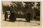 The casket holding Freida Albin is carried to the cemetery.