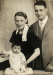 Studio portrait of Beatrice Heffes and her parents, Alfred Kahn and Rosa Moses.