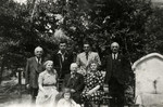 Group portrait of an extended Jewish family in Plovdiv wearing Jewish stars.