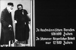 8th Nazi propaganda slide of a Hitler Youth educational presentation entitled "Germany Overcomes Jewry."

In kaufmännischen Berufen 106699 Juden/ In schwerer körperlicher Arbeit nur 1200 Juden
//
In the business sector 106,699 Jews/ In heavy physical work only 1,200 Jews
