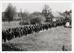 Clandestine photograph of prisoners marching to Dachau.