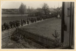 Clandestine photograph of prisoners marching to Dachau.