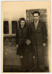 Portrait of a Jewish couple and their young son in the Poppendorf displaced persons' camp.