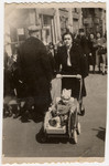 Victoria Avramoff pushes her daughter, Adela, down a street in Sofia, Bulgaria, shortly after the war.