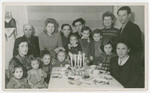 Adults and children celebrate in the Schlachtensee displaced persons camp.