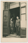 Emil Tennenbaum (later Tanner) and Leo Beller stand in front of the plywood business owned by Leo Tennenbaum (Paul Beller's maternal grandfather).