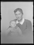 Studio portrait of Joszefine Lebovits holding her infant.