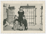 Group portrait of children probably in the Liebenau internment camp, a camp for foreign nationals.