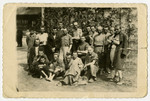 Group portrait of survivors [probably in the Dachau concentration camp.]