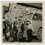 Jewish survivors from Czechoslovakia pose in front of their bus en route to Goteborg, Sweden.