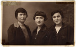 Studio portrait of three of the Rosenthal sisters including Rywka (the donor's mother).