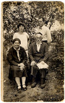 Members of the Rosenthal family pose in their garden.