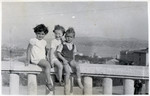 Joasia Klein and two other children pose on the campus of the Robert College in Istanbul, Turkey, overlooking  Bosphorus Strait.