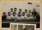 Group portrait of a ping pong team in the Hofgeismar displaced persons camp.