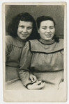 Studio portrait of cousins Malka and Rifka Weiss.