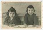 Close-up portrait of sisters Ellen and Rosa Zinger (children of Malka and Abram Zinger) in Belgium, prior returning to the Bergen-Belsen displaced persons camp.