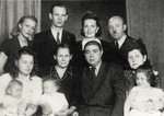 Group portrait of the Ecksteins (a Slovak Jewish family), with the Pajanko family, the Slovak family who hid their daughter.