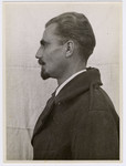 Mug shot of Nazi physician Dr. Fridolin Karl Puhr stationed at Dachau, who was arrested when the camp was liberated by American forces on April 29, 1945.