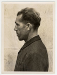 Mug shot of S.S. guard Wilhelm Tempel stationed at Dachau, who was arrested when the camp was liberated by American forces on April 29, 1945.
