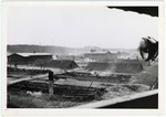 View of the still smoldering barracks at the Landsberg (Kaufering Lager I) sub-camp of Dachau concentration camp.
