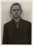 Mug shot of S.S. guard Peter Betz stationed at Dachau, who was arrested when the camp was liberated by American forces on April 29, 1945.