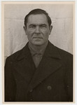 Mug shot of an S.S. guard Sylvester Filleboeck stationed at Dachau, who was arrested by the Americans when they liberated the camp on April 29, 1945.