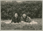 Hanka Bratman Fisch and Hanna Bratman lie on the lawn of the Lampertheim displaced persons camp.