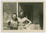 Close-up portrait of two unidentified young women [probably in the Bergen-Belsen displaced persons camp.]