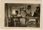 Female Jewish displaced persons working in a sewing circle at a refugee camp in Cyprus.